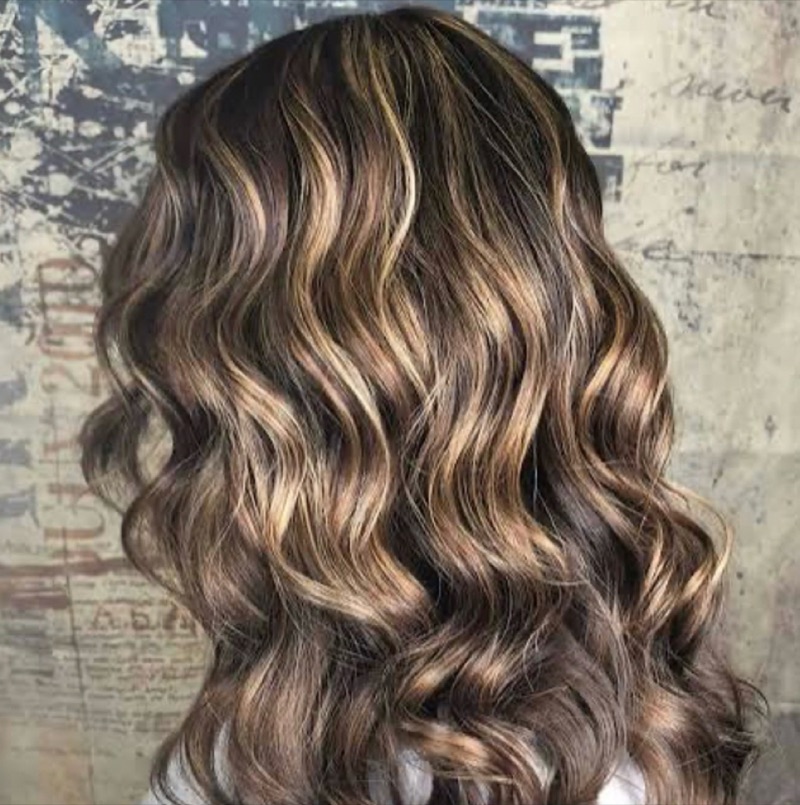 Long wavy hair with dimensional highlights